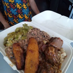 Ox tails okra peas and coconut rice