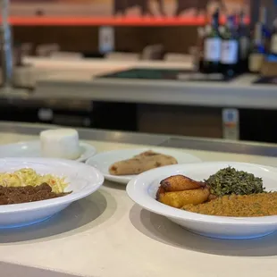 Goat Stew/Mbuzi Mchuzi (No Sides), Cabbage "Kabeji"Corn, Corn Fufu "Ugali', Lentils/ Ndengu, Spinach, Fried Sweet Plantains / Ndizi Kaanga