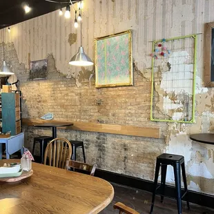 a wooden table and chairs