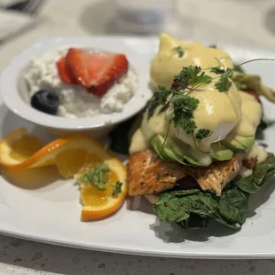 Salmon Benedict - delicious! Grilled salmon fillet, two poached eggs, delicious Hollandaise sauce, english muffins.