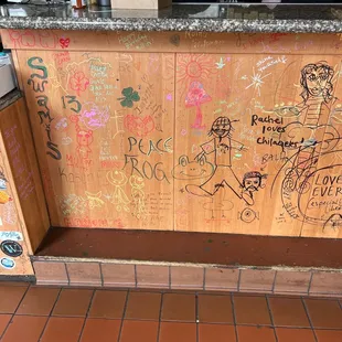 a counter covered in graffiti