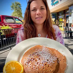 My Sis and her pumpkin pecan pancakes.