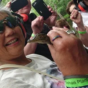 My mom (the brave one) holding the gator chick