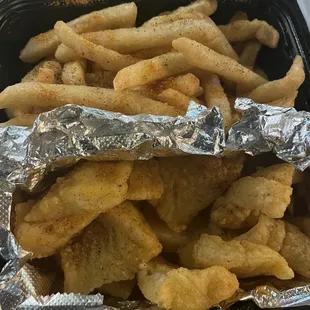 Fish Nuggets - 8 Count and comes with fries - Cajun seasoning extra $1 and they give u about 1.5 tsp. Of it in a container on side