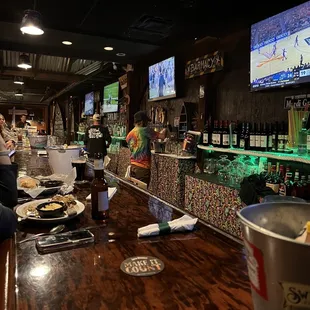 people sitting at the bar