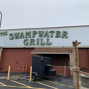 the entrance to the swampwater grill