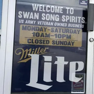 a sign in the window of a store