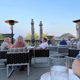 a group of people enjoying a meal