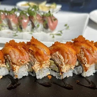 Seared Salmon Roll in foreground, Otoro Roll in background