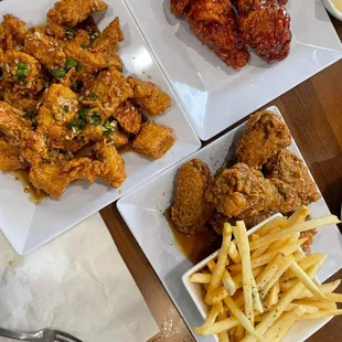 Boneless galbi wings(left) . Fries YUM and soy garlic wings(bottom right) . Sweet and spicy wings (top right)