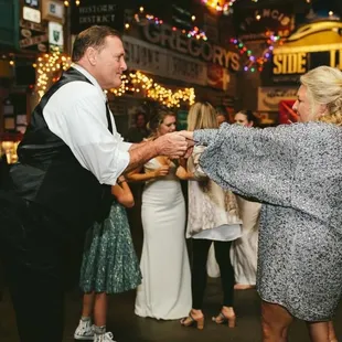a couple dancing at a wedding