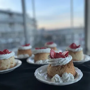 a plate of cake with strawberries on top