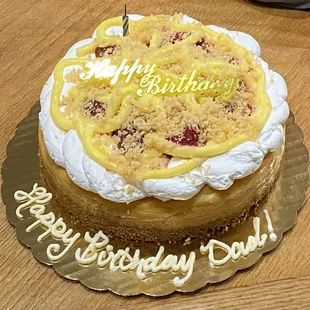 Strawberry lemon topping on plain cheesecake. Delicious!