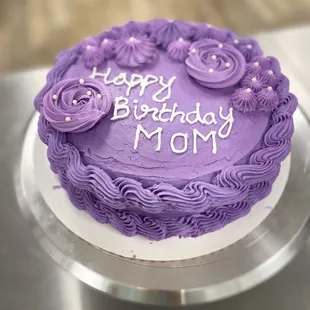 a purple birthday cake