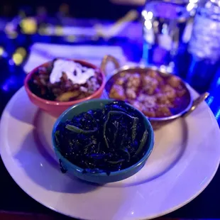 Orange tofu, spinach and plantains with salsa and crema. Yum!