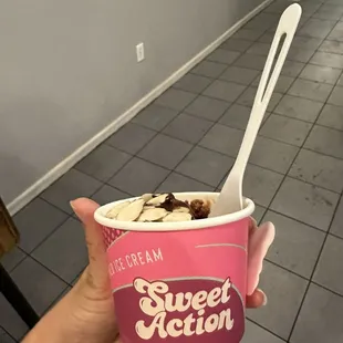 Vegan chocolate walnut blondie with chocolate sauce and almonds