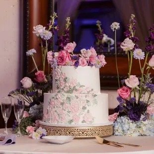 a wedding cake with flowers
