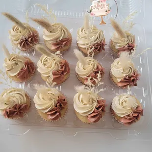 a tray of cupcakes