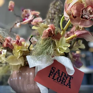 Beautiful floral arrangement that greets you at the door.