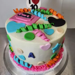 a birthday cake decorated with colorful icing