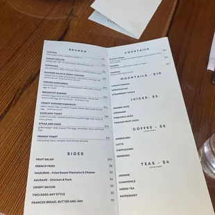 a menu on a wooden table