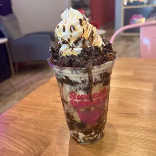 Brownie with vanilla, caramel pecan, chocolate and caramel sauce