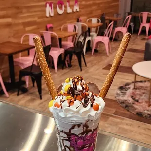 an ice cream sundae at a sweet and boozy ice cream shop
