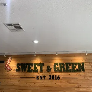 a sign for sweet and green