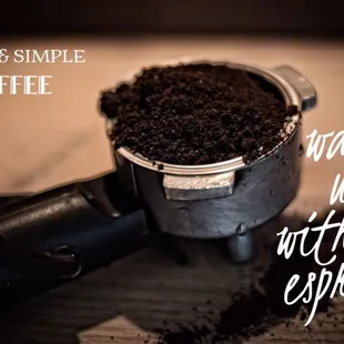 a coffee pot filled with dirt