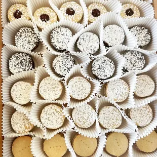 A box of 50 alfajores for your next event. Featuring classic, chocolate, coconut and guava.