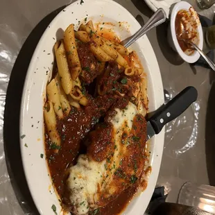 a plate of pasta and sauce