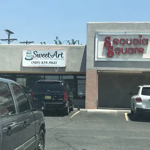 a car parked in front of a store