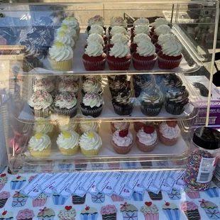 a display of cupcakes