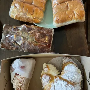 Tres leches, croissant (stuffed with custard and strawberry), banana nut cake, coconut buns.