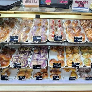 I also bought the custard bun and thought the bread portion doesn't seem as soft as other Asian bakeries.