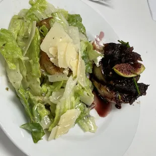 First course dishes including fig &amp; goat cheese on grilled crostini with port syrup and a caesar salad with sourdough croutons