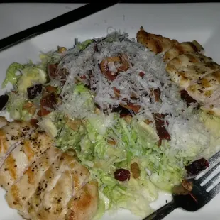 Shaved brussel sprout salad w/chicken breast, dried cherries, bacon, candied pecans, honey dijon &amp; gorganzola shredded cheese