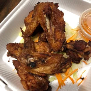 over fried, and barely and meat on the wings at all