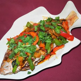 Red Snapper deep fried whole and with cilantro,  mushrooms and bell peppers