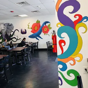 a colorful mural on the wall