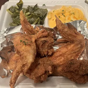 Fried chicken, green and Mac N Cheese.