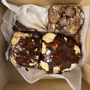 a box of chocolate covered pastries