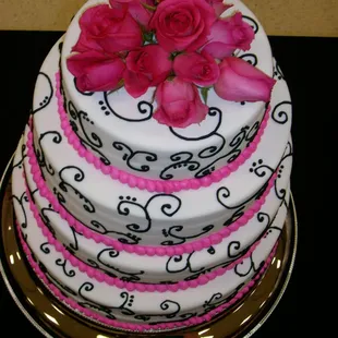 Wedding cakes, round cakes, cupcakes and sheet cakes:  www.sweetbitesbylizzie.com