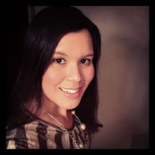 Angela E.