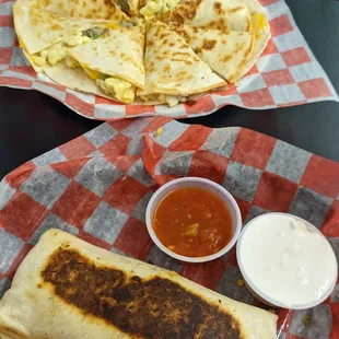 two quesadillas and a side of salsa