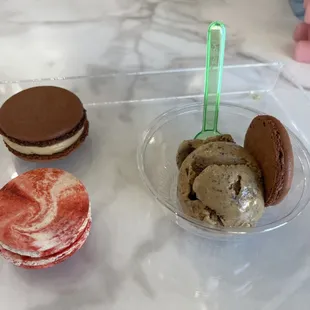 coffee macaron, raspberry macaron, and single scoop of coffee chip ice cream