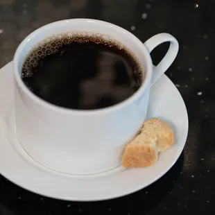 Our house blend coffee complimented with with a luscious biscotti!