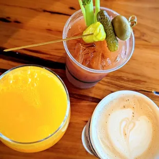 Holy Trinity of drinks.  Mimosas, Bloody Mary, Latte