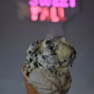 Cookies &apos;N&apos; Cream on top and Bourbon Espresso on bottom in a waffle cone @ericeatsagain on IG