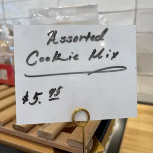 a piece of paper with a note attached to it